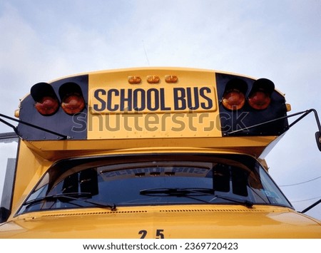Front view of a yellow school bus in The United States of America, USA