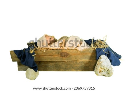 
baby Jesus Christ in a manger christmas story