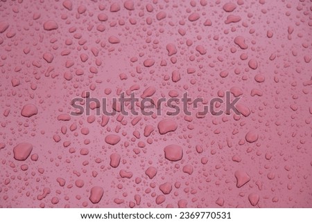Water drop abstract background wallpaper on claret red color wet surface area. Selective focus included.
 Royalty-Free Stock Photo #2369770531