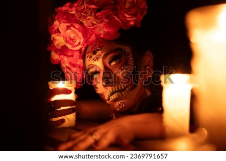 Calavera Catrina sitting on a throne. Sugar skull makeup. Dia de los muertos. Day of The Dead. Halloween. Royalty-Free Stock Photo #2369791657