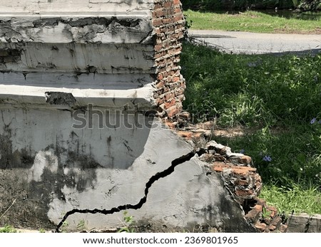 a crack in the wall of a building.