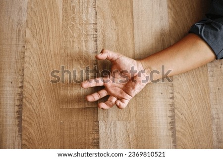 Hands with convulsions and muscle spasms, seizure disorder. Royalty-Free Stock Photo #2369810521
