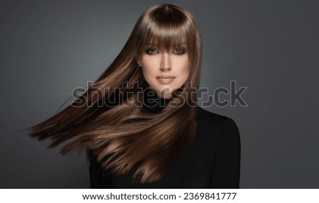 Beautiful model girl with shiny brown and straight long  hair . Keratin  straightening . Treatment, care and spa procedures. Smooth hairstyle
 Royalty-Free Stock Photo #2369841777
