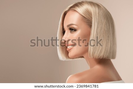 Beautiful model girl with short straight hair .Beauty woman with blonde Bob   hairstyle  .Fashion, cosmetics and makeup Royalty-Free Stock Photo #2369841781