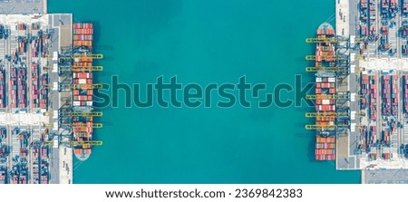 Aerial top view of container ship loading and unloading at cargo shipping port at hot day, Global business cargo freight transportation, nautical vessel, container box, cargo container in deep seaport Royalty-Free Stock Photo #2369842383