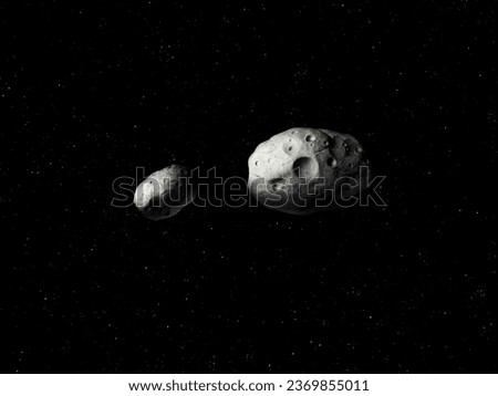 Two asteroids in space. Asteroid with impact craters with a satellite.