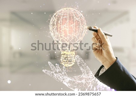 Man hand with pen draws virtual Idea concept with light bulb illustration on blurred office background. Multiexposure