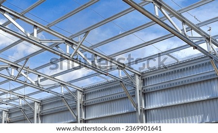 Light steel structur warehouse, metal pillar construction, cladding warehouse Royalty-Free Stock Photo #2369901641