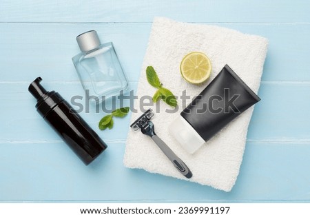 Set of men's shaving tools on wooden background, top view Royalty-Free Stock Photo #2369991197