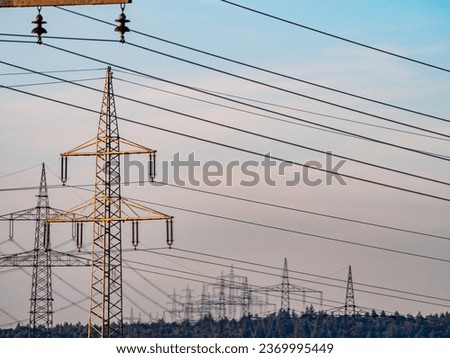 High voltage pylons in the field