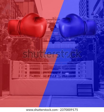 Boxing ring arena with red and blue boxing gloves. Royalty-Free Stock Photo #2370009175