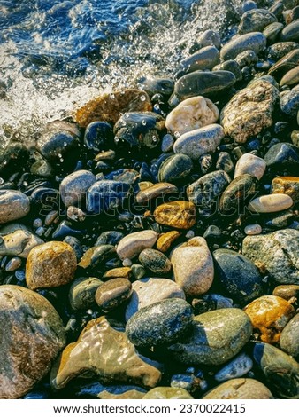 pebble stones on the sea shore, beautiful photo digital picture