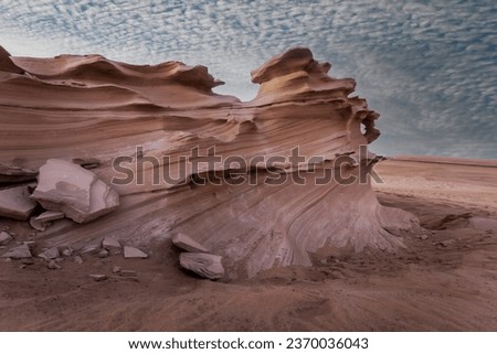 Huge sandstone sedimentary structure. Abu Dhabi, UAE. Al Wathba Fossil Dunes Royalty-Free Stock Photo #2370036043