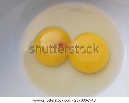 Real picture, double yolks in the egg with bloodstains