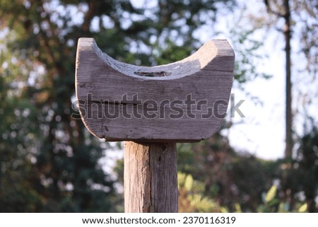 WOODEN SUPPORT STAND  IN VILLAGE FARM