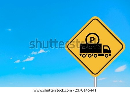 Truck Parking Sign with Sky in the Background