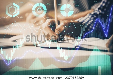 Multi exposure of two men planing investment with stock market forex chart background. Concept of research and trading.