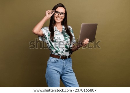 Photo of successful lovely lady entrepreneur wear stylish print clothes work use wireless modern device isolated on beige color background