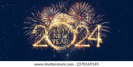 Happy New Year 2024. Creative New Year web banner sparkling text Happy New Year 2024 on night sky background with fireworks. Wide angle holiday poster Royalty-Free Stock Photo #2370169145