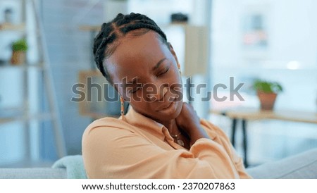Home, neck pain and black woman on sofa with stress, muscle cramp and injury in living room. Medical accident, burnout and upset person massage shoulders for inflammation, strain and tendinitis