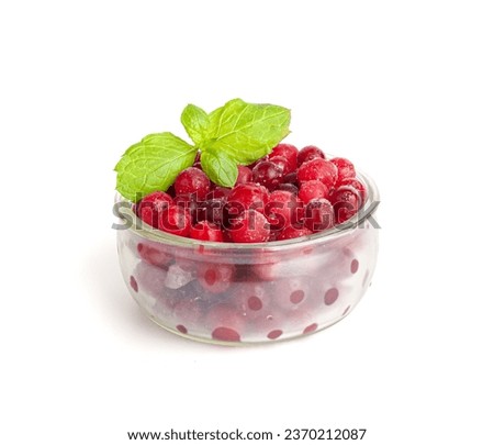 Frozen Lingonberry Isolated, Iced Cowberry Pile, Snow Cranberry in Glass Bowl, Red Viburnum Berries, Frozen Lingonberry on White Background Royalty-Free Stock Photo #2370212087