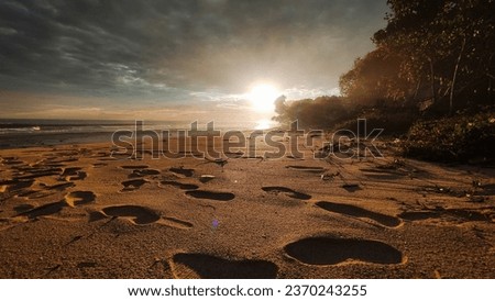 footprints on Malang beach, Java