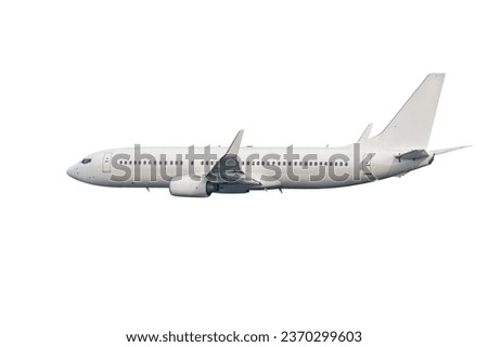 Passenger airplane flying isolated on white background Royalty-Free Stock Photo #2370299603