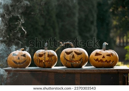 Jack O' Lanterns glowing. Halloween background