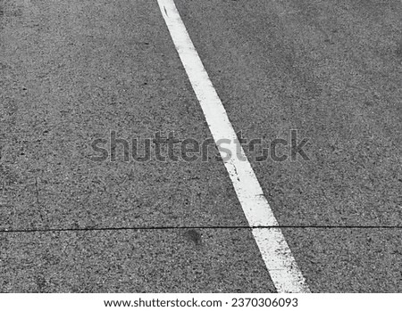 a white line on a road.