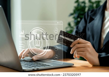 Online banking concept, Businesswomen using mobile phone and credit card with digital bank icon with indicators on laptop screen.