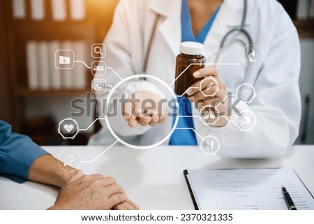 Medicine doctor using digital tablet and smartphone diagnose virtual electronic medical record on interface.Digital healthcare and network on virtual screen medical technology 
