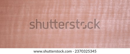 Closeup texture of wooden flooring made of Anigre from Africa