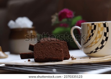 nice photo of slice of chocolate cake and cup of coffee
