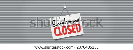 Sorry! we're closed on door sign Royalty-Free Stock Photo #2370405251