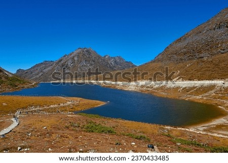 Sela lake located on the north side of Sela pass at an elevation of 4,160 metres (13,650 ft). Lake often freezes during the winter and is drained in Nuranang River, Royalty-Free Stock Photo #2370433485