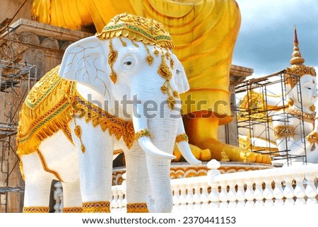 Elephant statue in front of the temple Wat Nong Phong Nok, Nakhonpathom, Thailand.