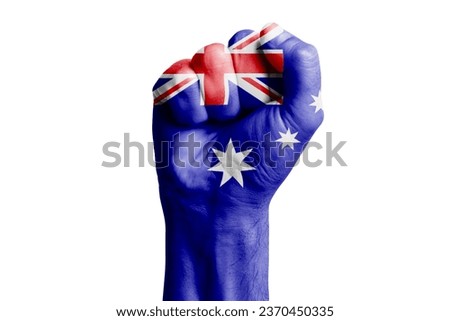 Man hand fist of AUSTRALIA flag painted. Close-up