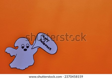 happy halloween background - ghost on the orange background 