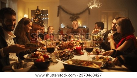 Portrait of a Female Dining Together at a Big Table with Family Members. Loved Ones Talking, Laughing and Enjoying Tasty Meals. Intimate Dinner Setting with Diverse Guests Celebrating Christmas