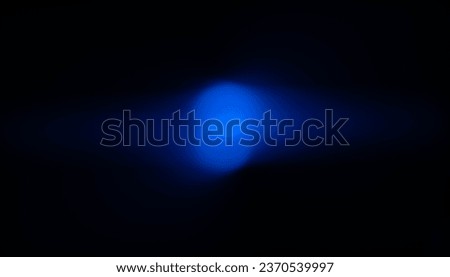 Light from incandescent photography, light from LED bulbs, and from different colored monitors. The main background colors are black, blue, red, purple, and white.