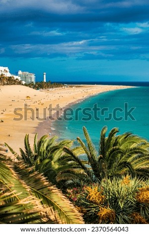 Morro Jable, Fuerteventura, Spain. Breathtaking beach Playa del Matorral in the rays of the sunset. Morro Jable and Playa del Matorral, Fuerteventura, Canary Islands, Spain, Atlantic, Europe Royalty-Free Stock Photo #2370564043