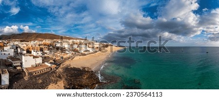 Morro Jable, Fuerteventura, Spain. Breathtaking beach Playa del Matorral in the rays of the sunset. Morro Jable and Playa del Matorral, Fuerteventura, Canary Islands, Spain, Atlantic, Europe Royalty-Free Stock Photo #2370564113