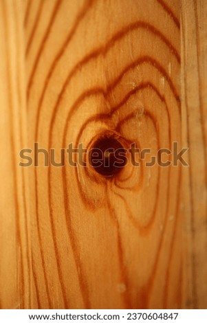 Wooden lacked brown surface macro close abstract texture plate of pine wood with a branch eye knot hole background brown yellow wooden stock photography big size high quality prints