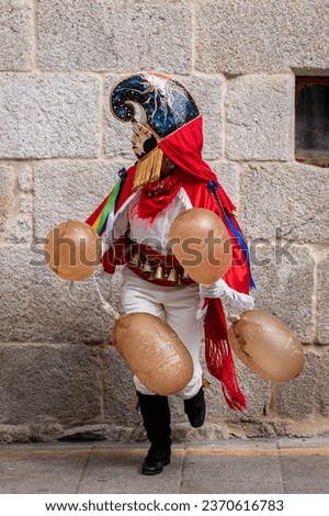 Xinzo de Limia, Spain 02 21 2023: Traditional mask of Xinzo de Limia Carnival. A Pantalla. Event of international tourist interest. Ourense, Galicia. Spain. Royalty-Free Stock Photo #2370616783
