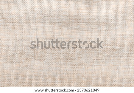 Light brown color natural linen texture, fabric background.