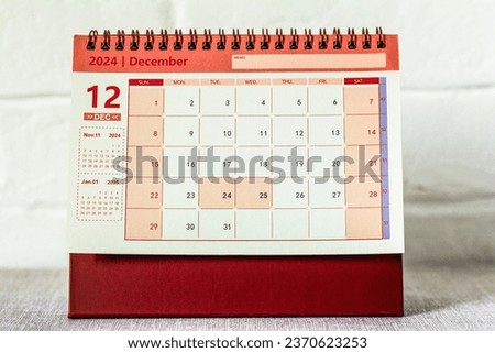 December calendar 2024 on the background of a wooden table.Planning for every day