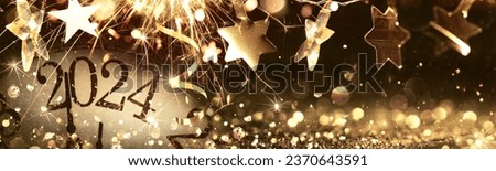 New Year's Eve 2024 Celebration Background with Star Royalty-Free Stock Photo #2370643591