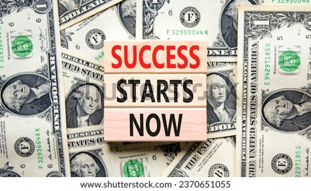 Success starts now symbol. Concept word Success starts now on beautiful wooden block. Dollar bills. Beautiful dollar bills background. Business motivational success starts now concept. Copy space.