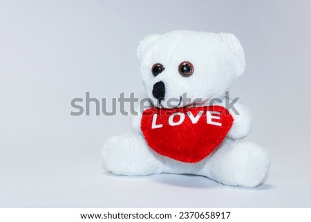 The Love Bear is a charming and huggable teddy bear designed to spread love and warmth on this special occasion. This heart is a symbol of affection and devotion, made from the same soft fabric.