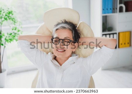 Portrait of attractive mature age businesswoman hands head sleep after colleagues meeting comfort isolated on light room office background